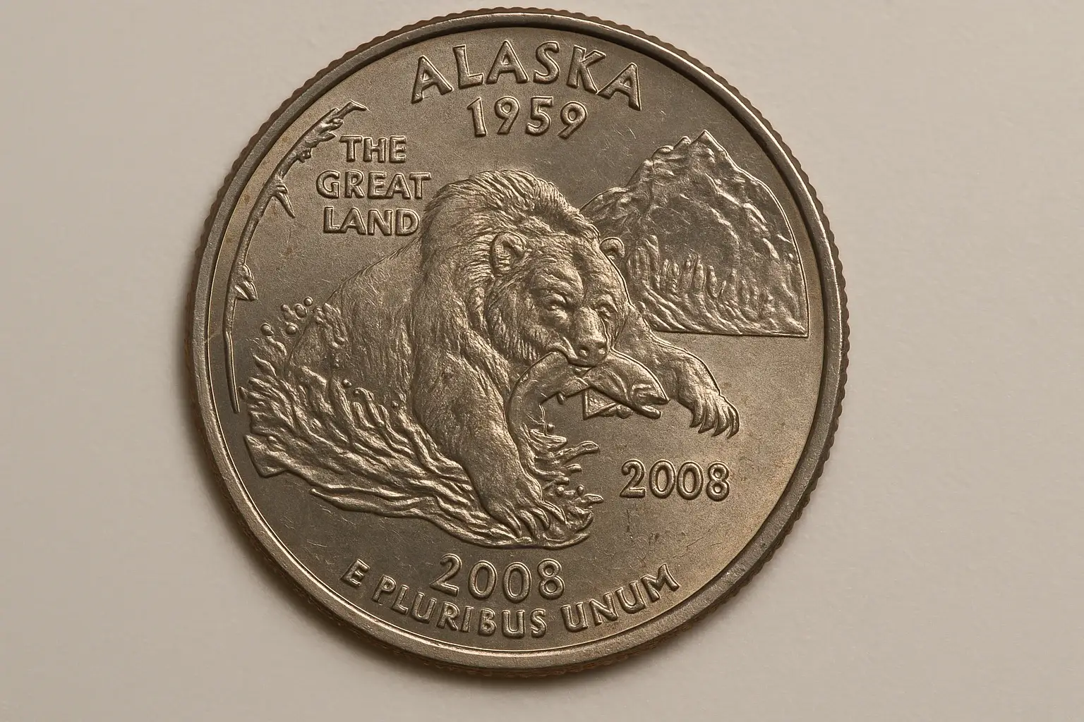 2008 quarter reverse showing Alaska’s bear with salmon 